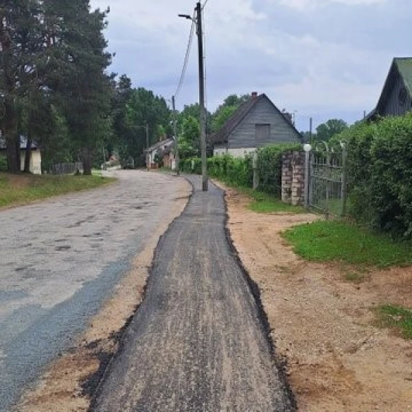 криво уложенная асфальтовая дорожка