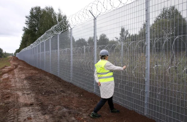 A Cuban Man Entered Latvia from Russia Through a Hole in the Fence