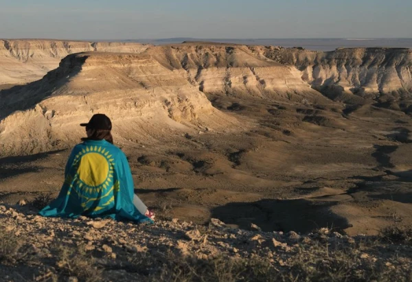 The President of Estonia is flying to Kazakhstan. Why?