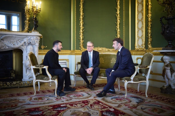 Why is Zelensky flying to Paris tomorrow?