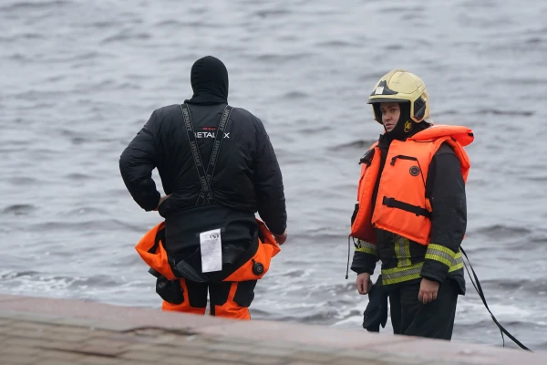 The body of a woman who drowned the previous day was retrieved from the bottom of the Daugava