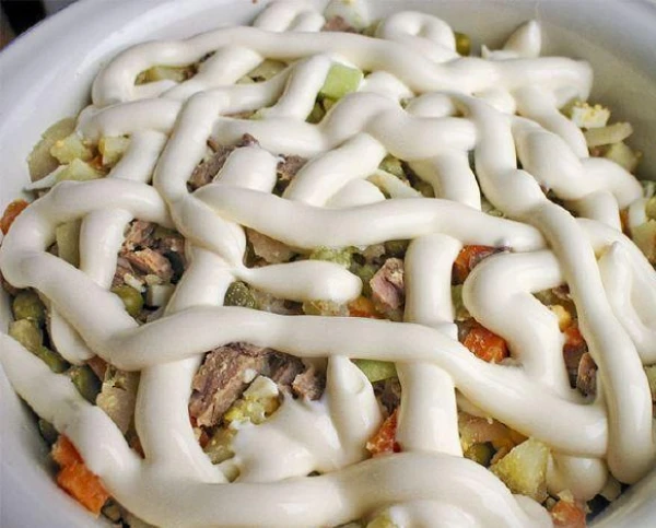 The Most Harmful Component in New Year's Salads: Dietitian's Tips for Substitution