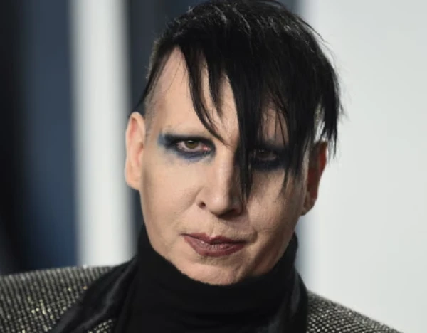 Его настоящее имя - Брайан Хью Уорнер.