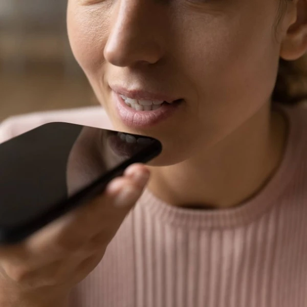 Important: Why do people hold their phone to their mouth like a sandwich?