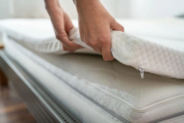 Is it illegal to remove tags from pillows and mattresses in the USA?