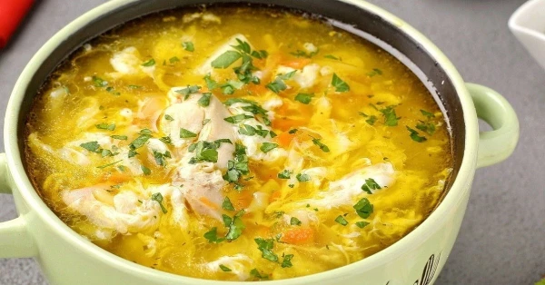 The Chef's Secret: How One Egg Transforms Chicken Soup into a Culinary Masterpiece