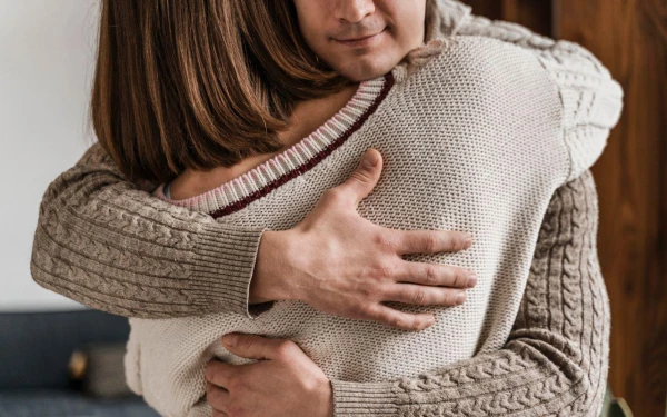 How Many Hugs a Day Are Needed for Happiness: A Scientific Approach