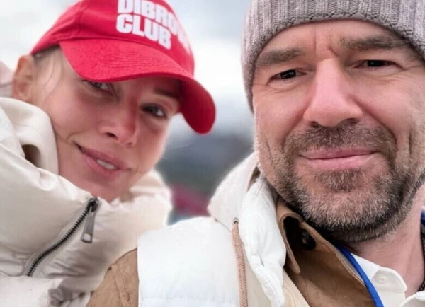 Polina Dibrova and Roman Tovstik admire icebergs while her children survive without gadgets at camp