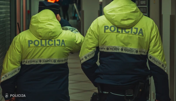 In a White Coat and with a Gun: Two 'Money Mules' Arrested in Riga During a Special Operation