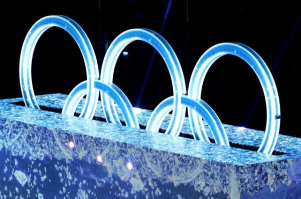 What prizes are awarded to Olympic champions in different countries?