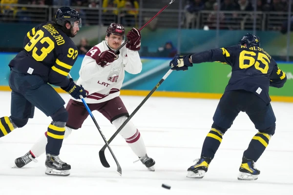 Latvian national team forward Eduards Tralmaks called up to the NHL for the first time