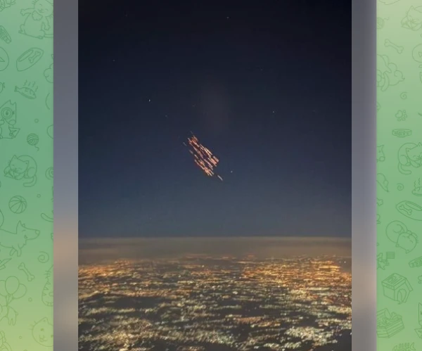 Iranian 'fire rain' in the sky over Israel captured from the cockpit of a plane