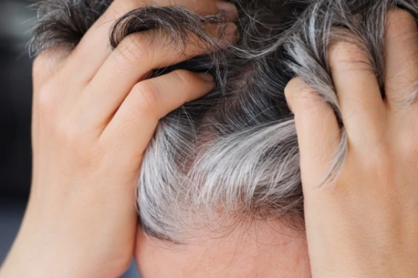 What Happens If You Pull Out a Gray Hair: A Dermatologist's Answer