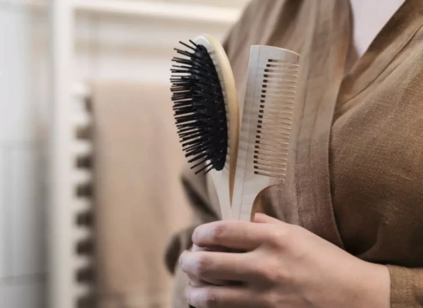 A Dirty Comb Compared to a Toilet Rim