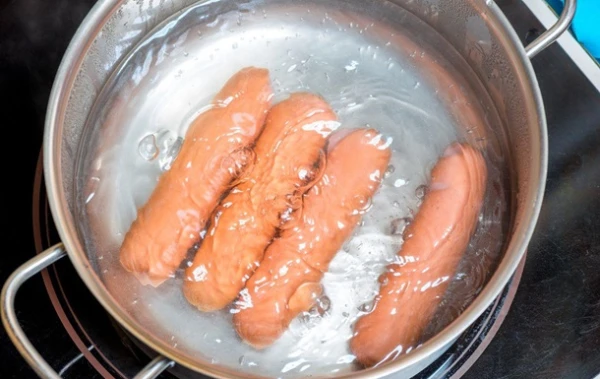 Why boil sausages if they are already cooked: habit or sense?