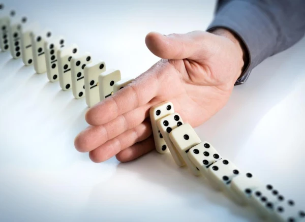 How long has the game of dominoes existed?