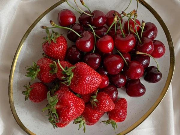 Strawberries and Cherries in April: What Lies Behind Their Beautiful Appearance