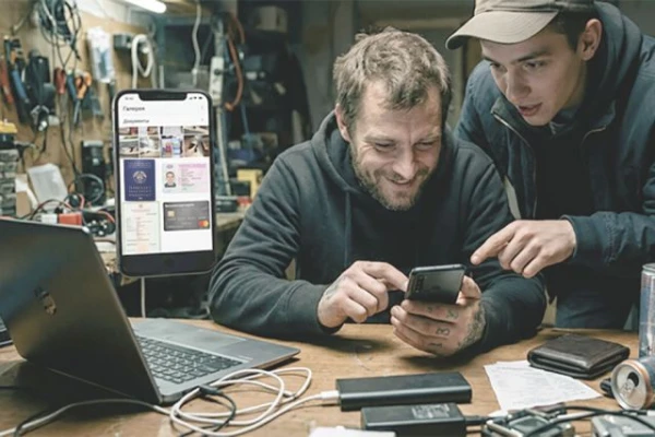 What photos on phones do scammers look for in Latvia?