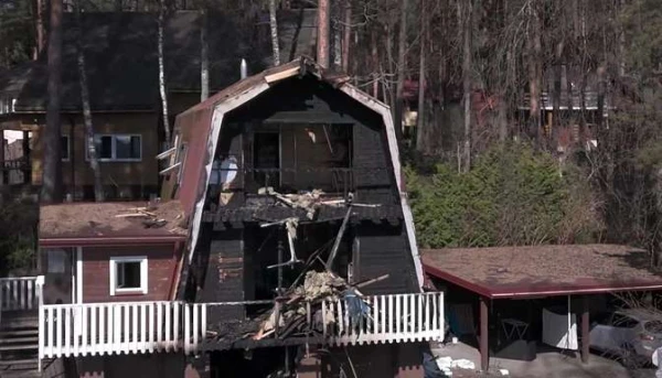 Due to an impassable road, residents of Carnikava were forced to watch as a small fire turned a house into ruins