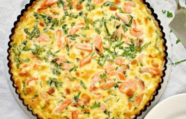 Pie with a Tender Filling of Red Fish and Spinach in Cream Sauce