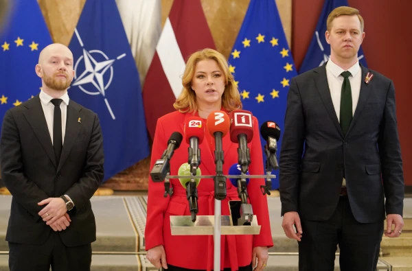 I Don't Want to Work, but There's No Escape: The Government of Latvia is in a 'Suitcase Mood'